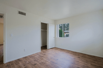Vacant room with wooden floor
